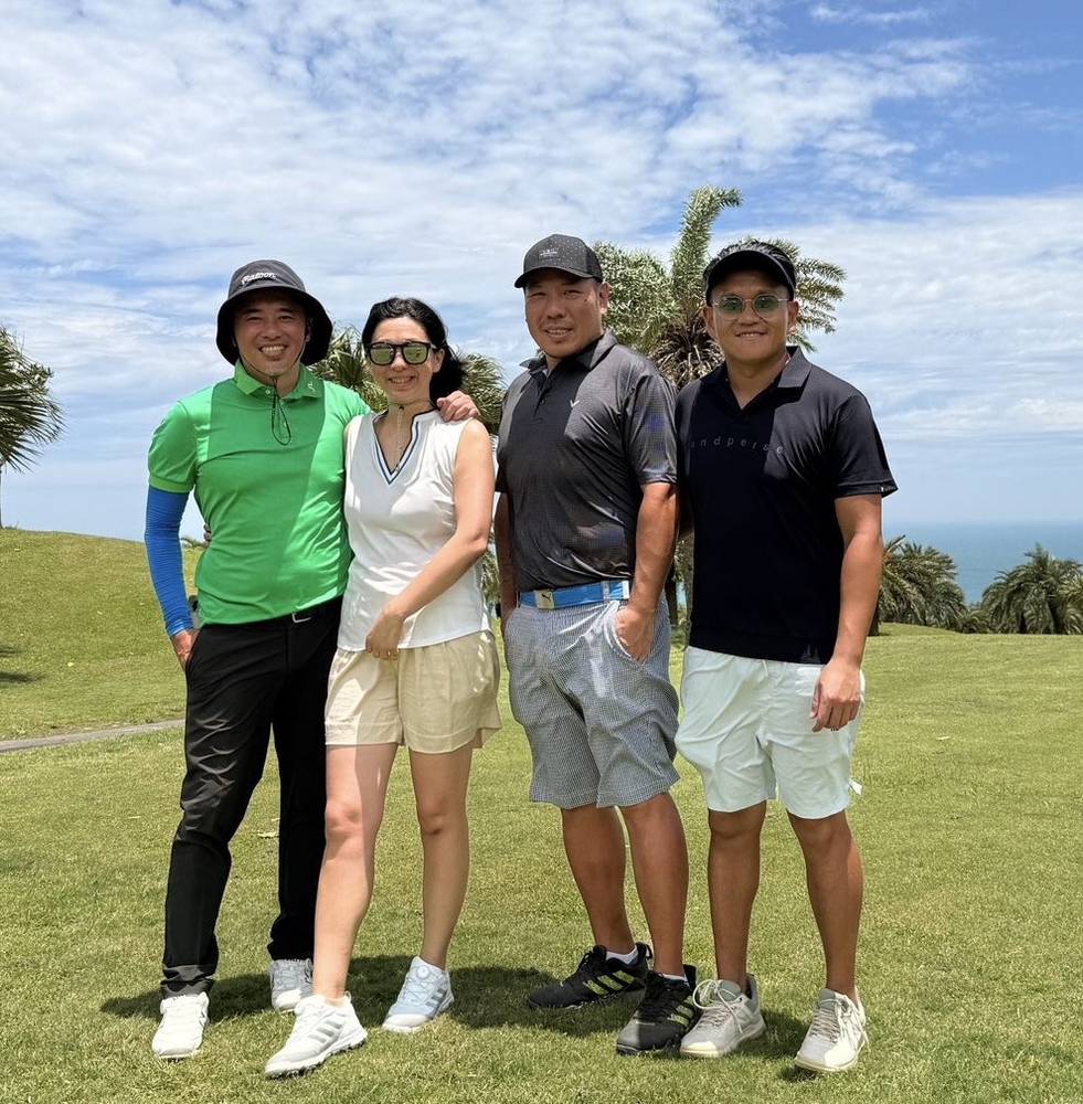 Four IGST golfers on a fairway with a sea view